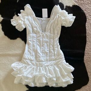 Jessica Bara ruffle sleeve dress